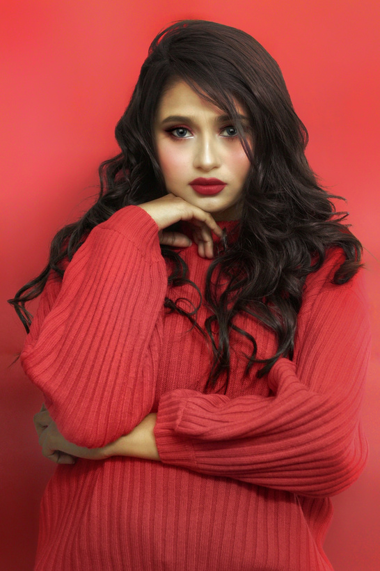 Photo Of Woman Wearing Red Sweater